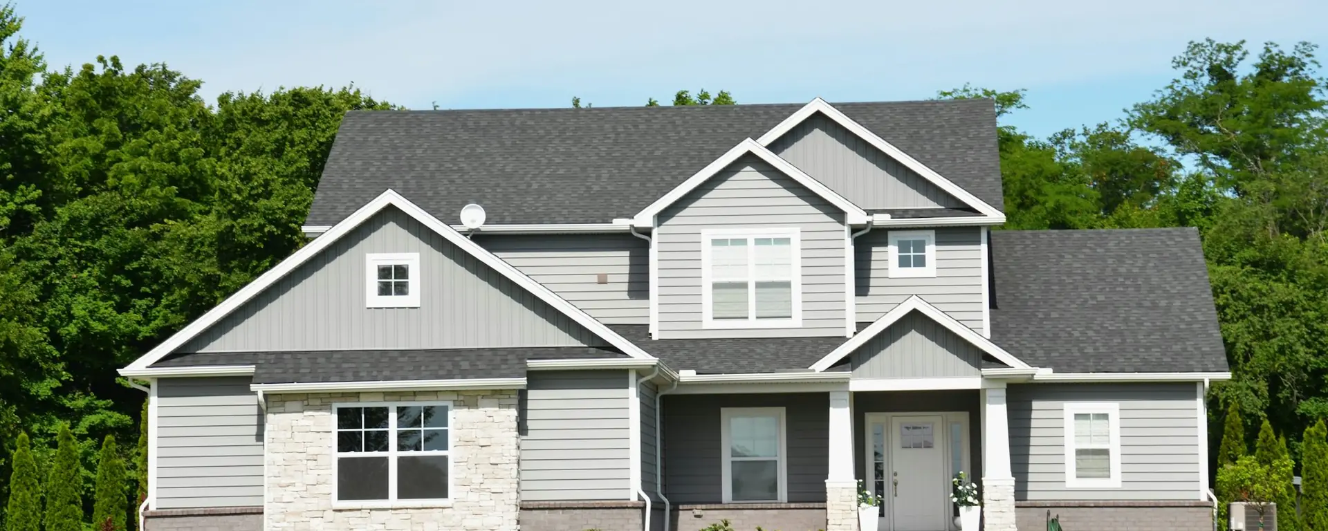 Two-storey family home with a freshly cut lawn